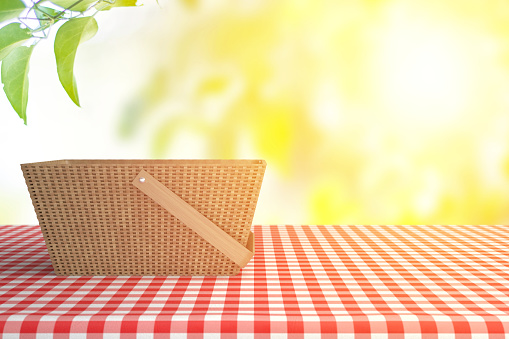 Empty Wooden Table with tablecloth And Blurred Green Nature Background. Backdrop for product.
