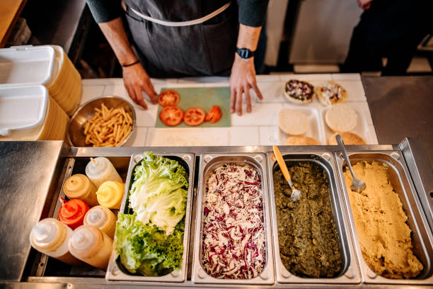 istock Burger bar salads choice in metal containers 1354896144