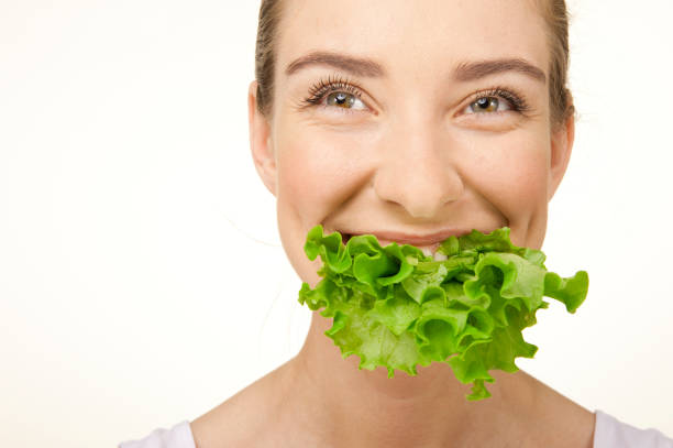 istock Woman with the lettuce 135489663