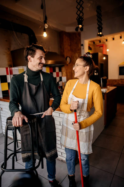 istock Cleaning before the end of working hours 1354896954