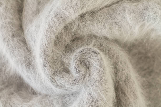 swirl of alpaca fabric and mohair wool texture - wol stockfoto's en -beelden