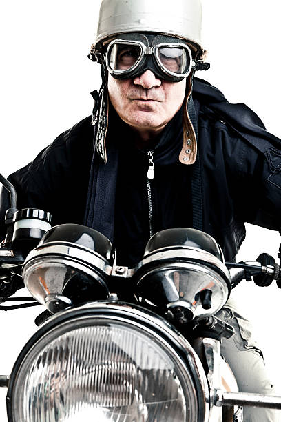 istock man drive his motorcycle with helmet and glasses 135489751