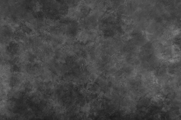 istock Medium gray background of natural cement or stone texture, use for wall banner and backdrops 1354900054