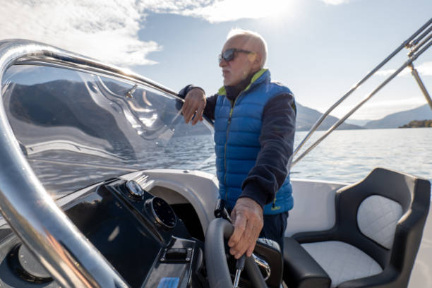 istock Mature man taking the boat out for a ride 1354901226