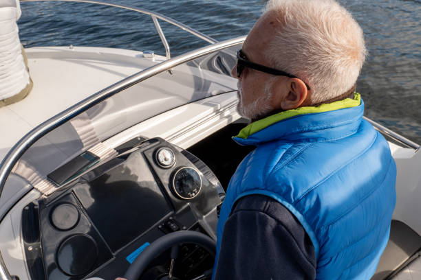 istock Mature man taking the boat out for a ride 1354901240