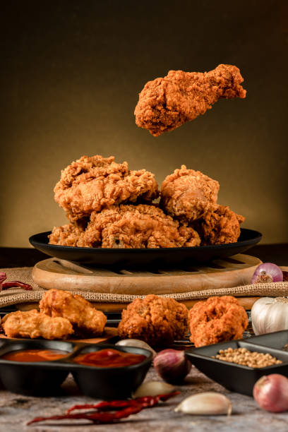 crispy fried chicken plate. Delicious homemade crispy fried chicken. Crunchy Fried Chicken Ready To Eat stock photo