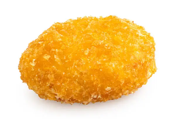 Fried gluten free cornflake crumb chicken nugget isolated on white.