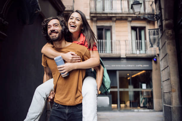 istock Happy young couple having fun during their journey in Barcelona 1354906741
