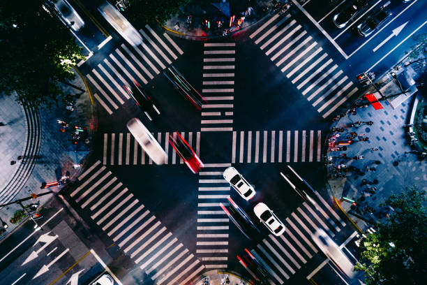 Drone Point View of City Street Crossing at Night stock photo