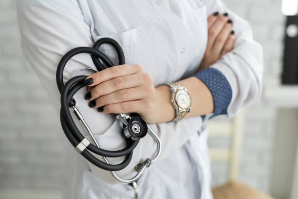 istock Doctor has a stethoscope in her hand 1354908655