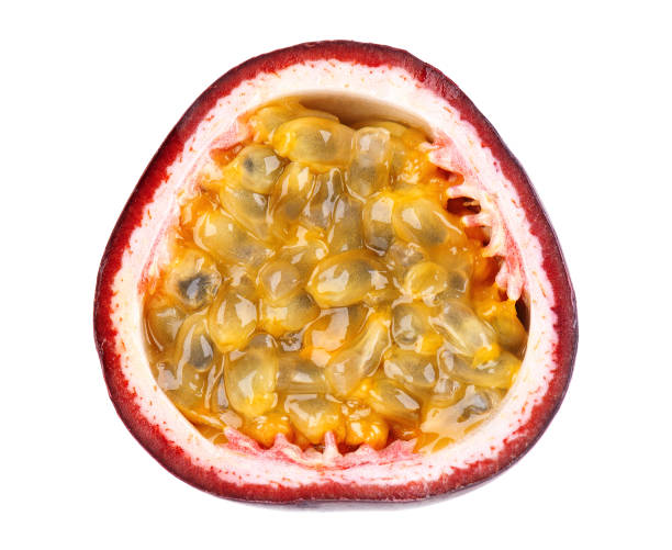 istock Passion fruit isolated on white background. Slice of passionfruit or maracuya, exotic fruit. Clipping path. Top view. 1354909752