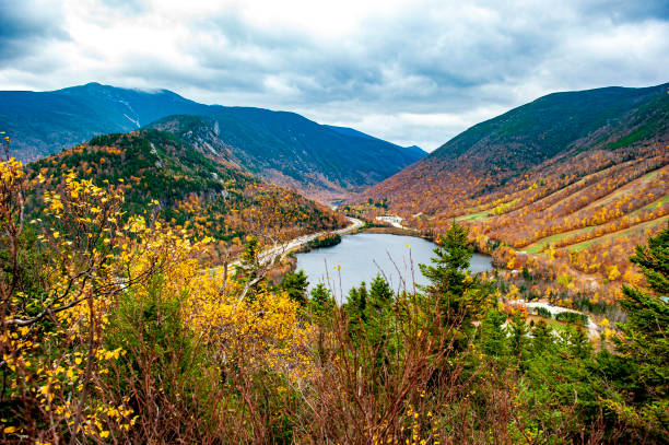 Franconia Notch A view of Franconia Notch as taken from atop Bald Mountain in Franconia, NH in New England. franconia new hampshire stock pictures, royalty-free photos & images