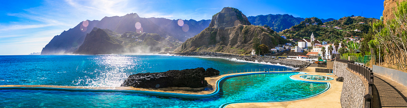 Scenic Madeira island, natural swimming pools of charming Porto da Cruz village. Popular tourist resort in Portugal