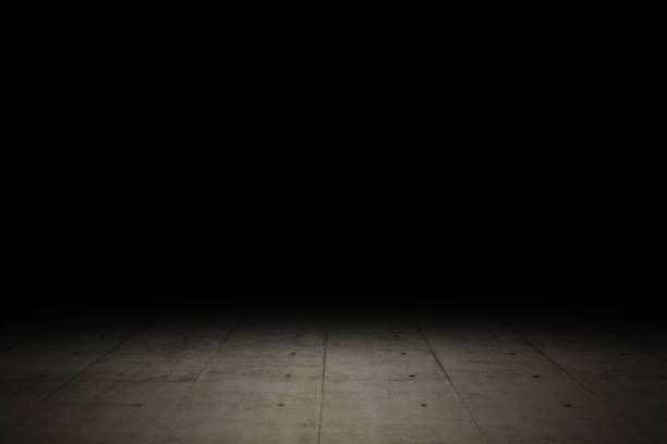istock Empty dark room interior decoration used as studio background wall to display products. Template for product display and copy space. 1354916284