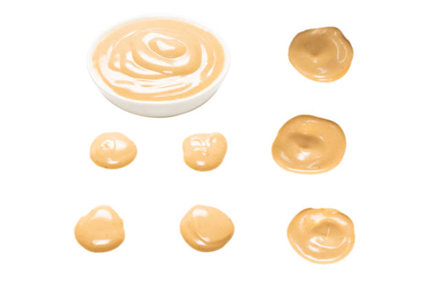 istock Mushroom sauce in a bowl isolated on white background. 1354916802