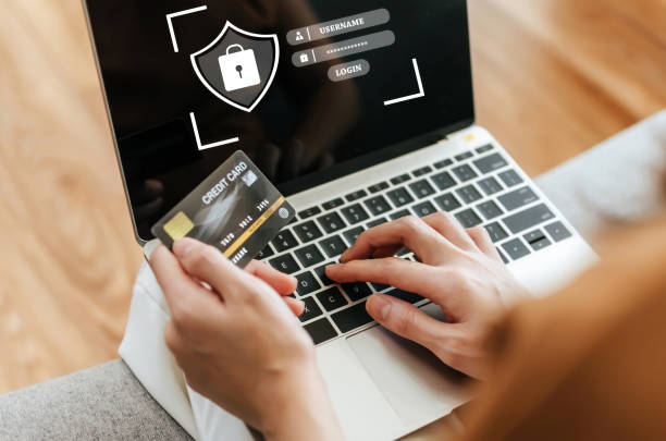 istock customer hand entering password code on laptop computer paying bill with credit card on desk at home office, internet, digital marketing, shopping online, online payment and digital technology concept 1354919345