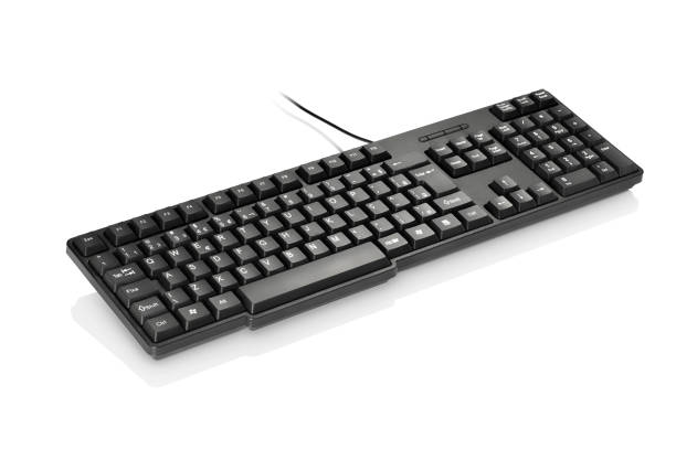 istock Three quarter view of simple black keyboard, isolated 1354922441