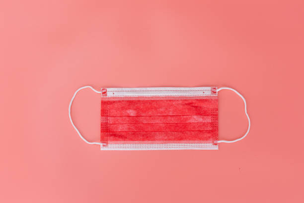 istock red medical mask 1354923292