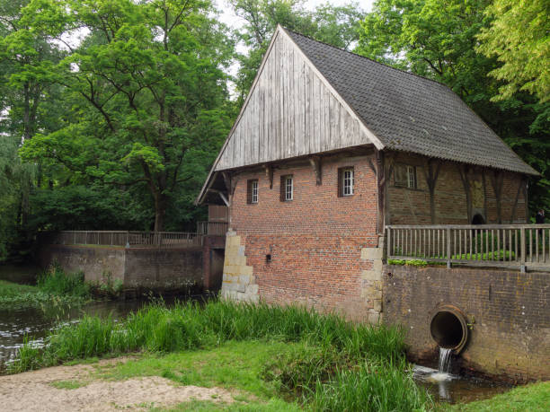 istock river and watermill in westphalia 1354923715