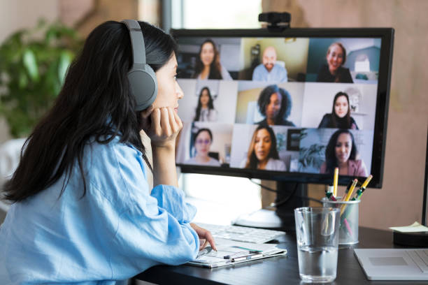 istock Bored college student attends online class 1354924001