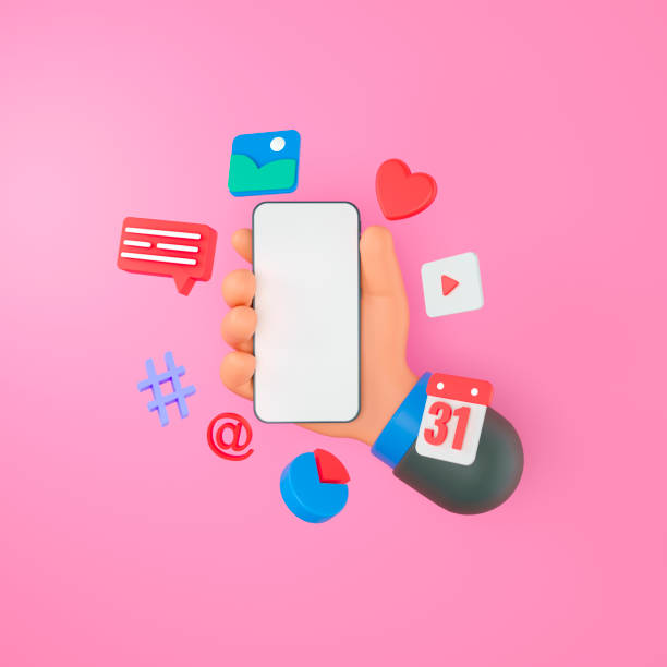 istock 3D Online Social media communication platform concept. Hand holding phone with emoji, comment, love, like and play icons. 3d render illustration 1354930203