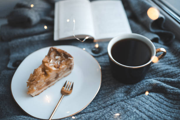 Cup of coffee with tasty cake at home