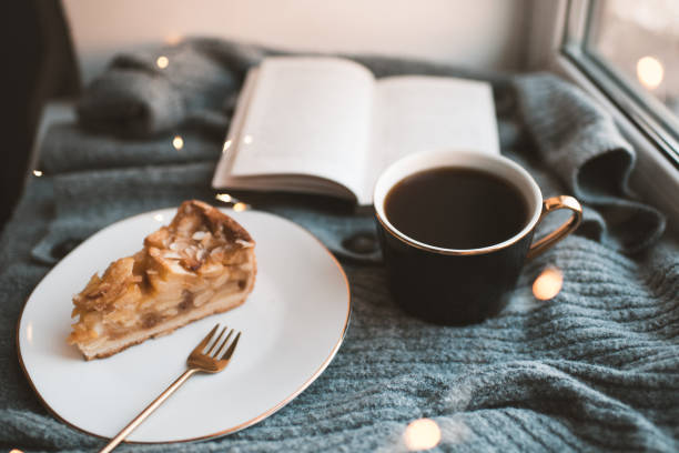 Cup of coffee with tasty cake at home
