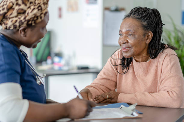 istock Filling Out a Health History 1354932034
