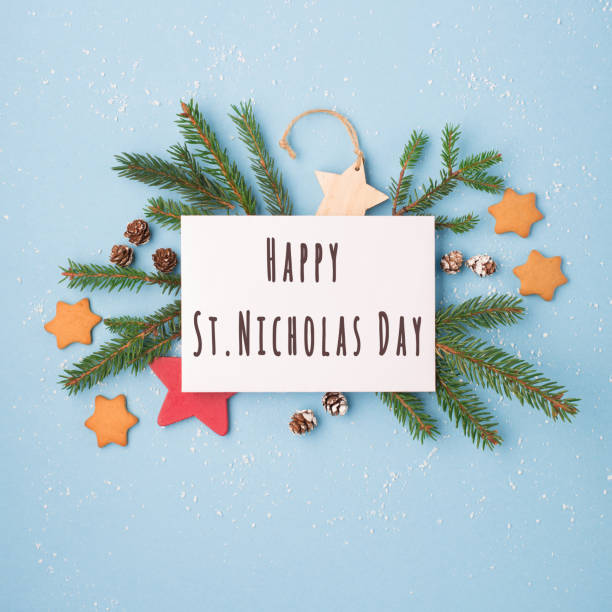 istock Christmas composition with sweets, candy, gingerbread cookies and gifts on dark blue background, top view.  Saint Nicholas Day, 6 December. 1354935105