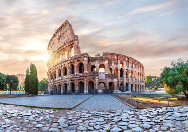 istock Coliseum in Rome at sunset, the main summer view, Rome, Italy 1354935754