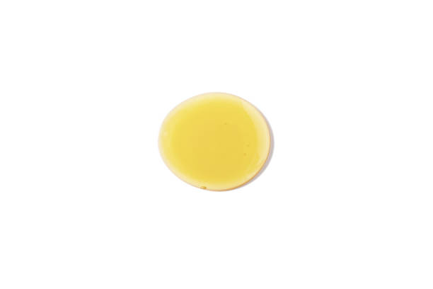 istock Honey drop isolated on white background. Top view. 1354936715