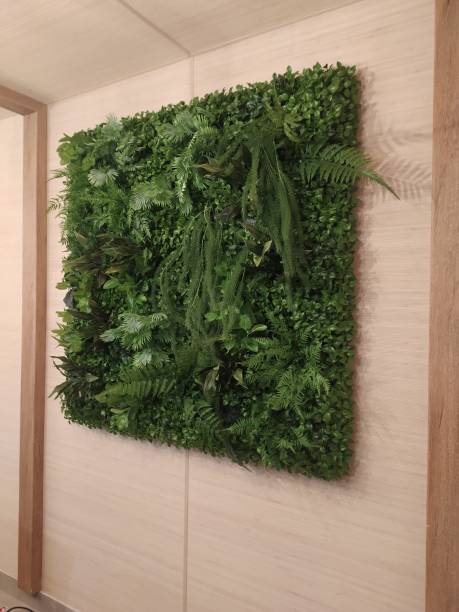 istock Artificial plants in the interior decor. Green design 1354938014