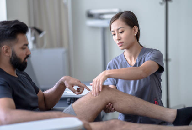 istock Physical Therapist Working on a Patients Knee 1354938518