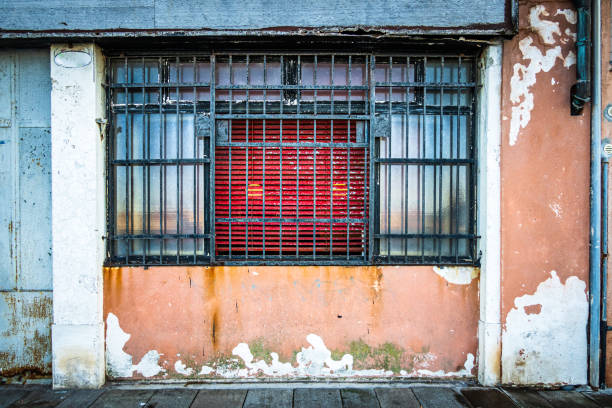 istock old wooden window at a facade 1354939639