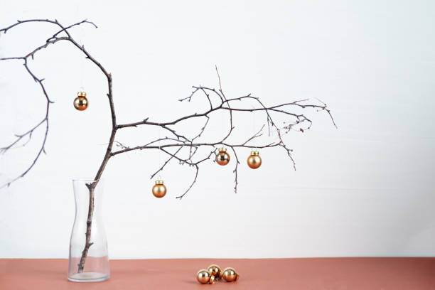 istock Wooden branch as alternative Christmas tree 1354939739