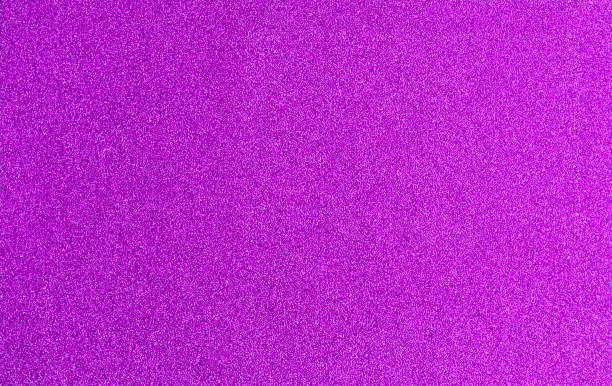istock Abstract vibrant background with purple glitter 1354940314