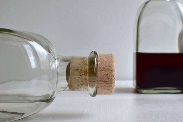 istock Cork in glass bottle close-up 1354941190