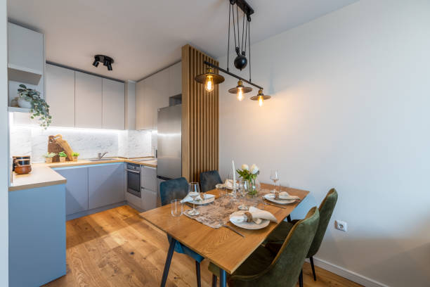 istock New modern kitchen with table served for dinner. New home. Interior photography. 1354941325