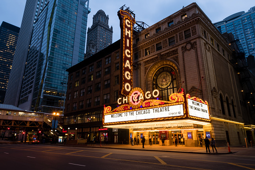 Chicago, USA - Mar 12, 2020: Early in the evening the illuminated Chicago Theater.