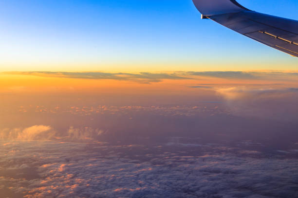 istock beautiful sunset as seen from the airplane 1354944213