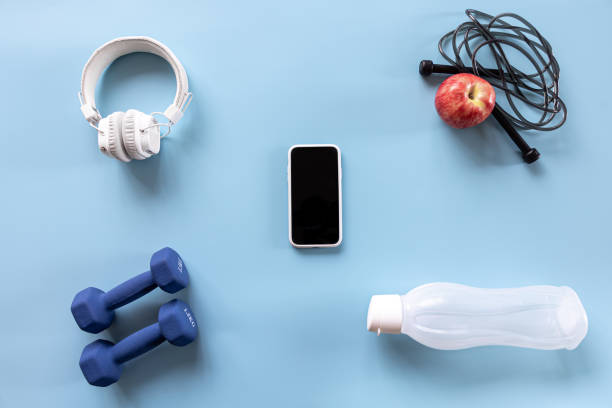 istock Sports equipment items on blue, flat lay. 1354944715
