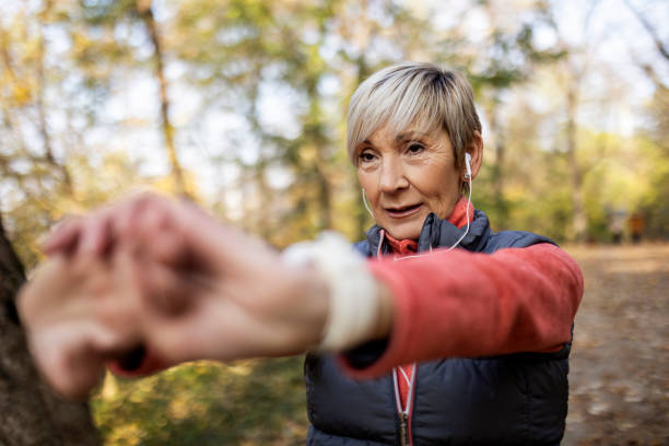 istock Senior woman exercise in park 1354944815