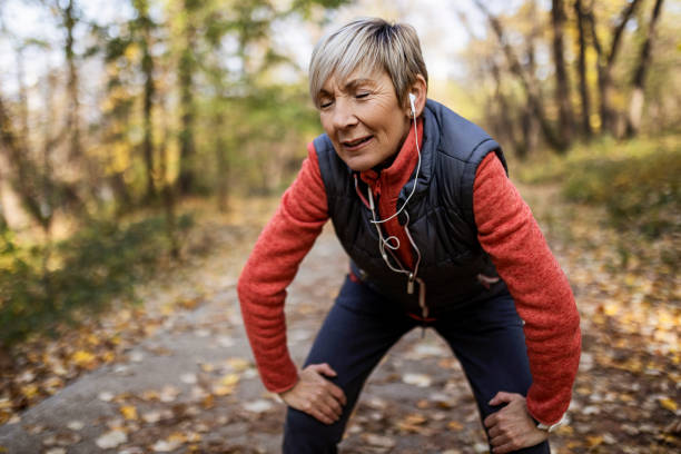 istock Senior Woman resting after training 1354944819