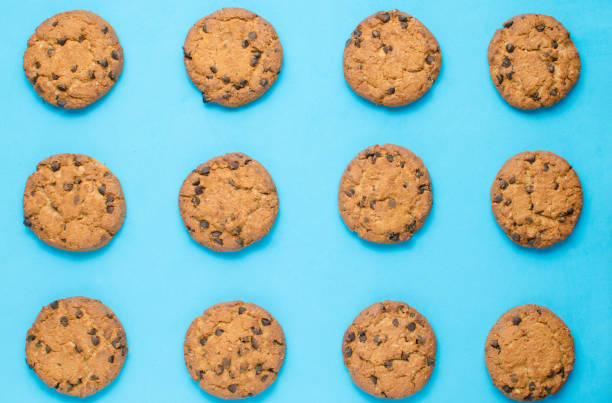 istock Cookies with chocolate on a blue background. 1354947623