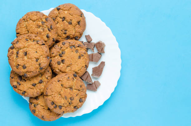 istock Cookies with chocolate on a blue background. 1354947624