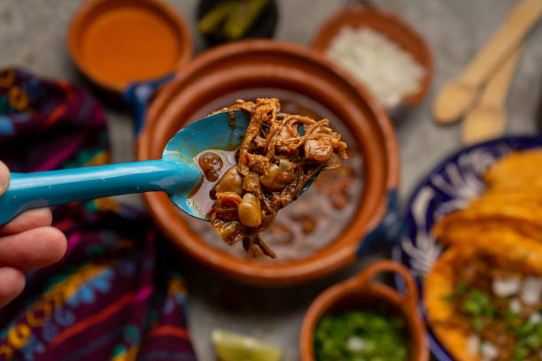 istock Beef birria with chickpeas on a gray background. Mexican food 1354947781