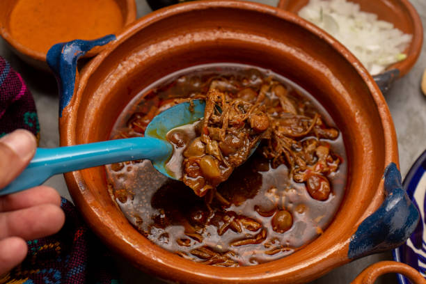 istock Beef birria with chickpeas on a gray background. Mexican food 1354948103