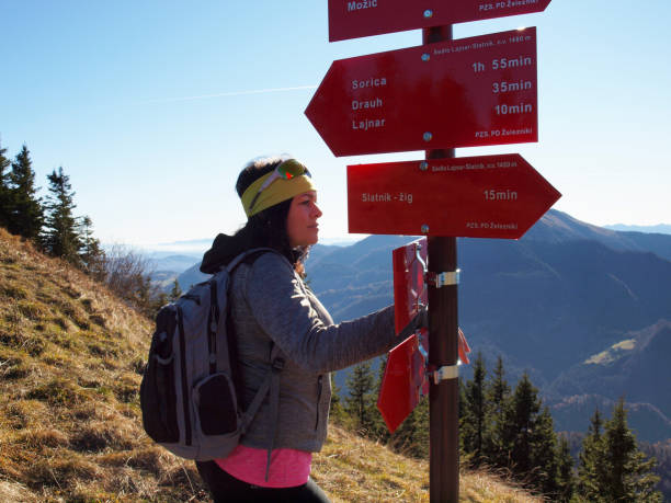istock Woman hiking in the mountains 1354948214