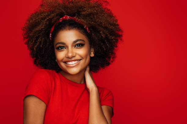 istock Pretty young afro woman 1354950554