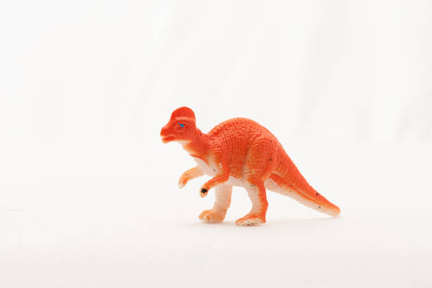 istock Plastic toy Corythosaurus dinosaur on white background.. 1354953355